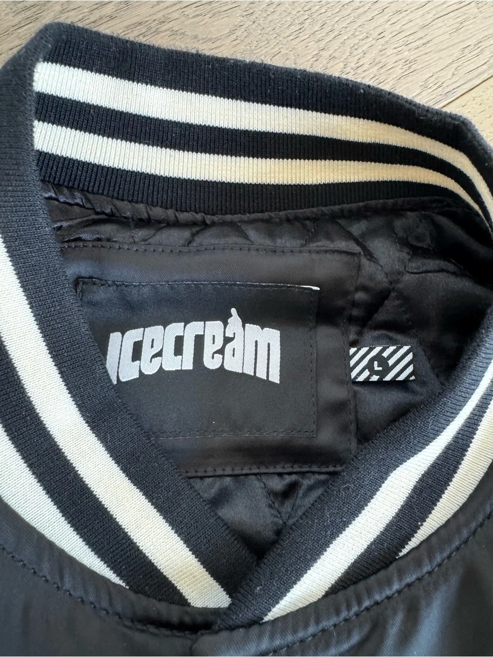 Icecream Black & Silver Varsity Bomber Jacket with Stacked-Face Patch